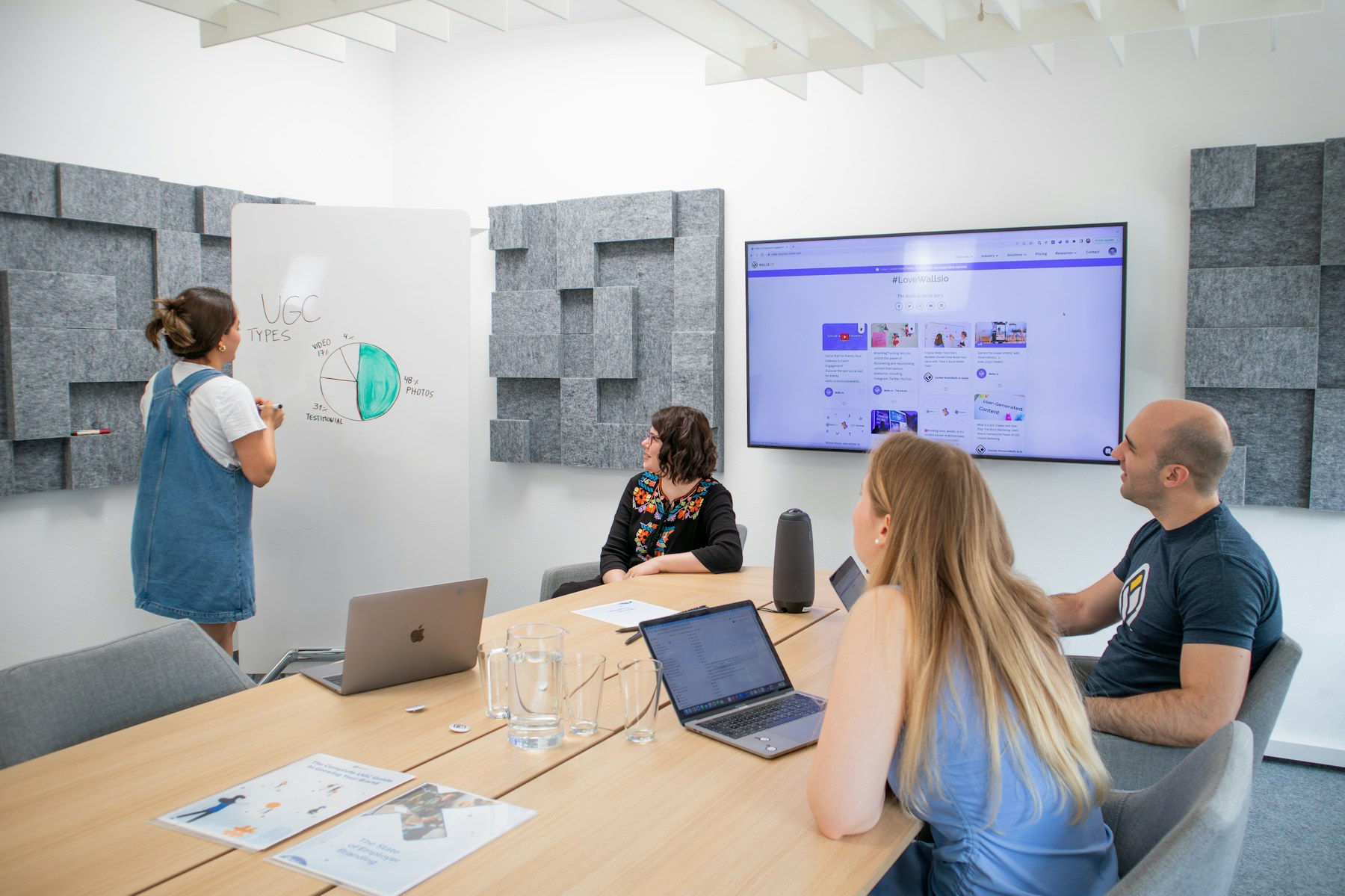 A marketing team reviewing campaign performance together